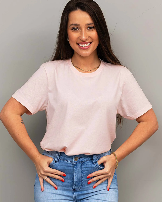 “Model wearing pink relaxed fit women’s 100% cotton T-shirt – front view.”