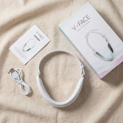 Flat lay of a portable facial steamer with its kit components arranged neatly on a clean neutral surface — premium Léonaé UK spa-tech presentation.